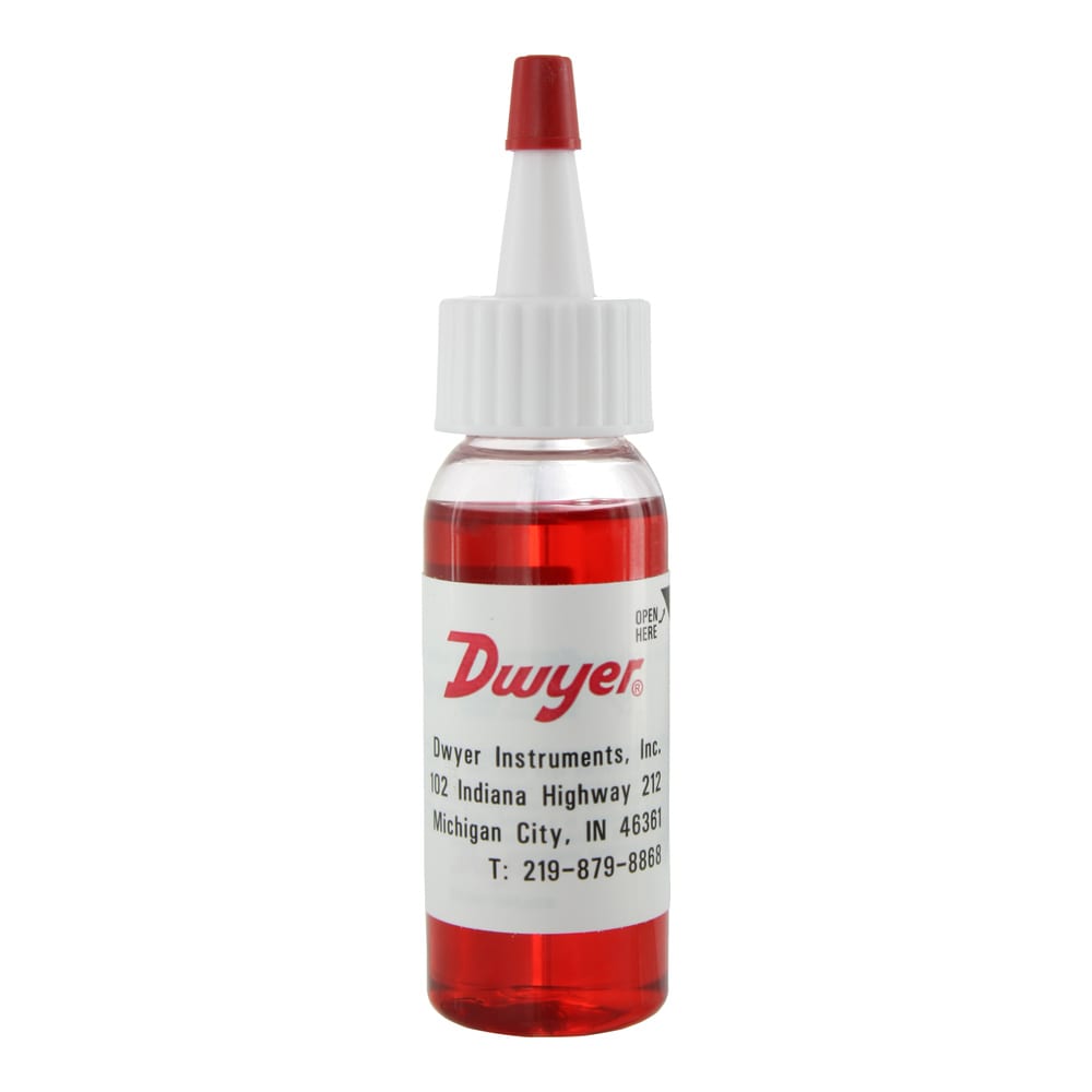 1 oz dispenser bottle of red gage fluid, .826 sp. gr.