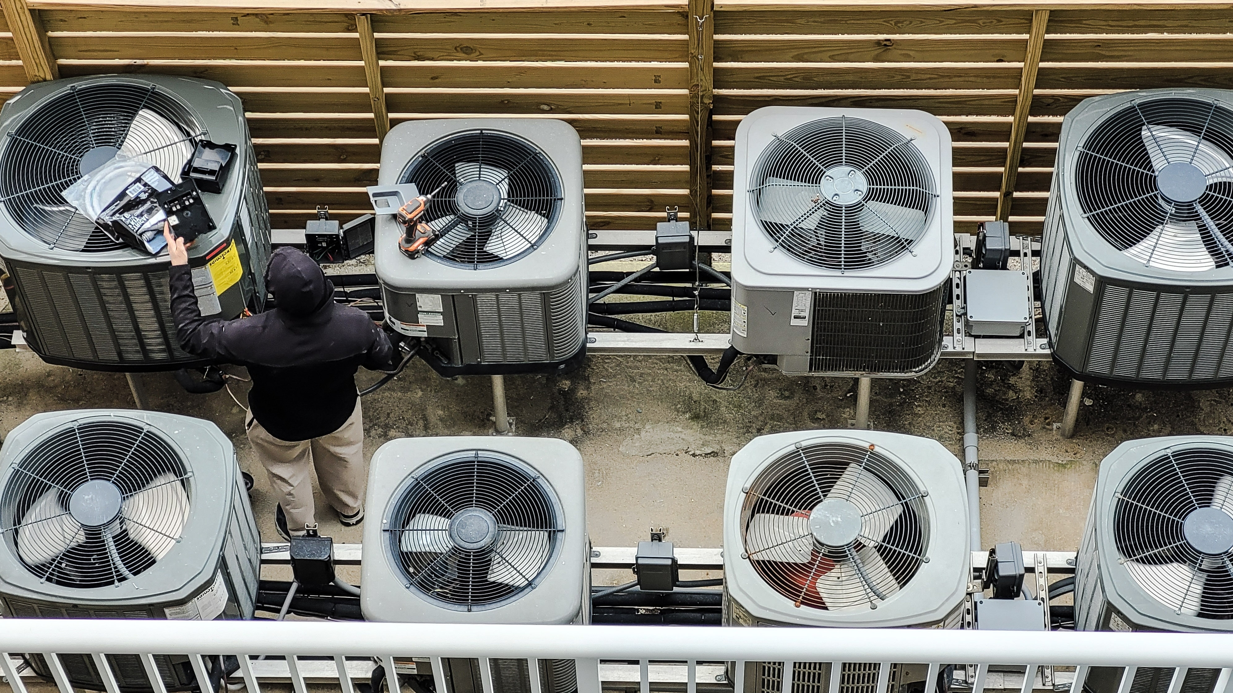 HVAC technician inspecting mechanical equipment